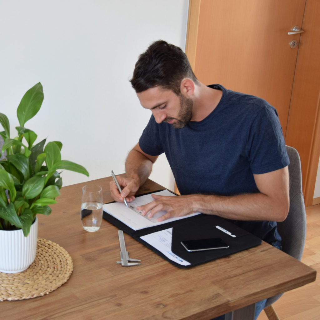 Picture of Wolfgang drawing the concept on a table