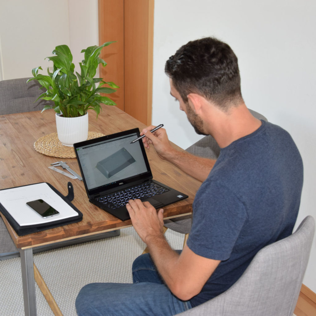 Wolfgang working on the Frunk design on a computer